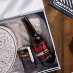 Com biscoitos salgados e a premiada 1906 Black Coupage, parceria entre Biscoitê e Estrella Galicia celebra o Dia dos Pais com sabor e afeto