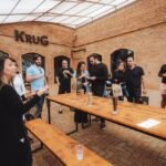 Krug Bier anuncia calendário de visitações 2026 com tour guiado na fábrica, degustação e a German Pils eleita a melhor Pilsen do Brasil.